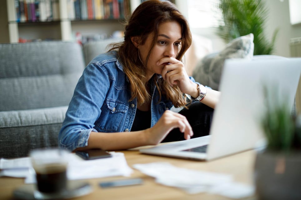 Woman-stressed-looking-at-computer-at-home-how-emotions-affect-learning