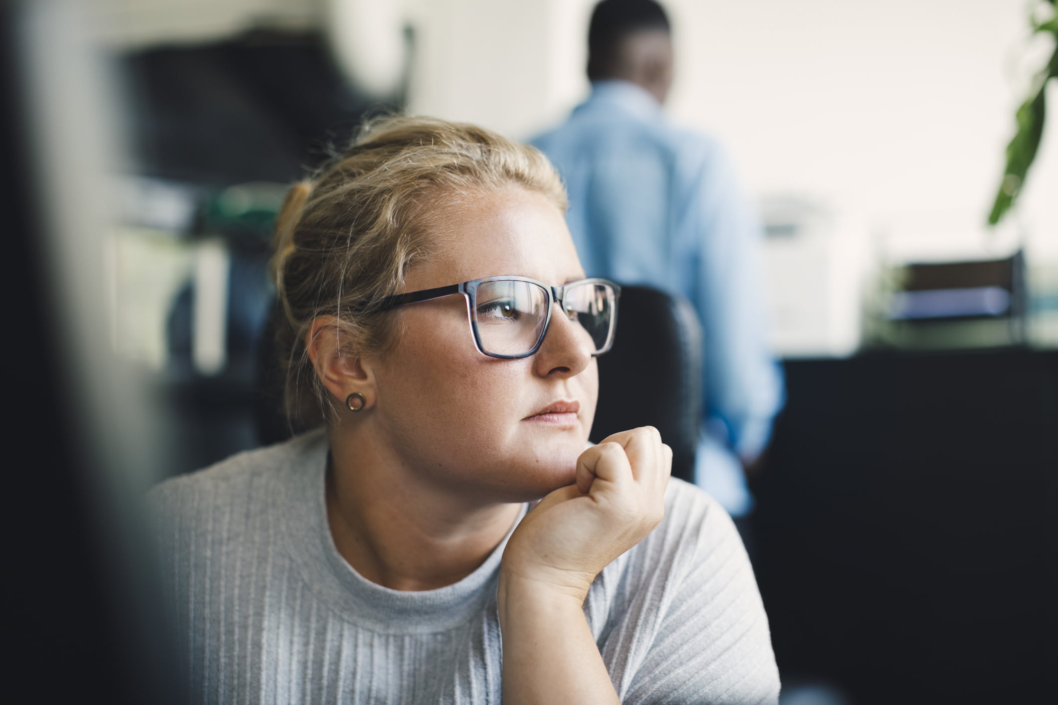 Woman-thinking-to-herself-dead-end-job