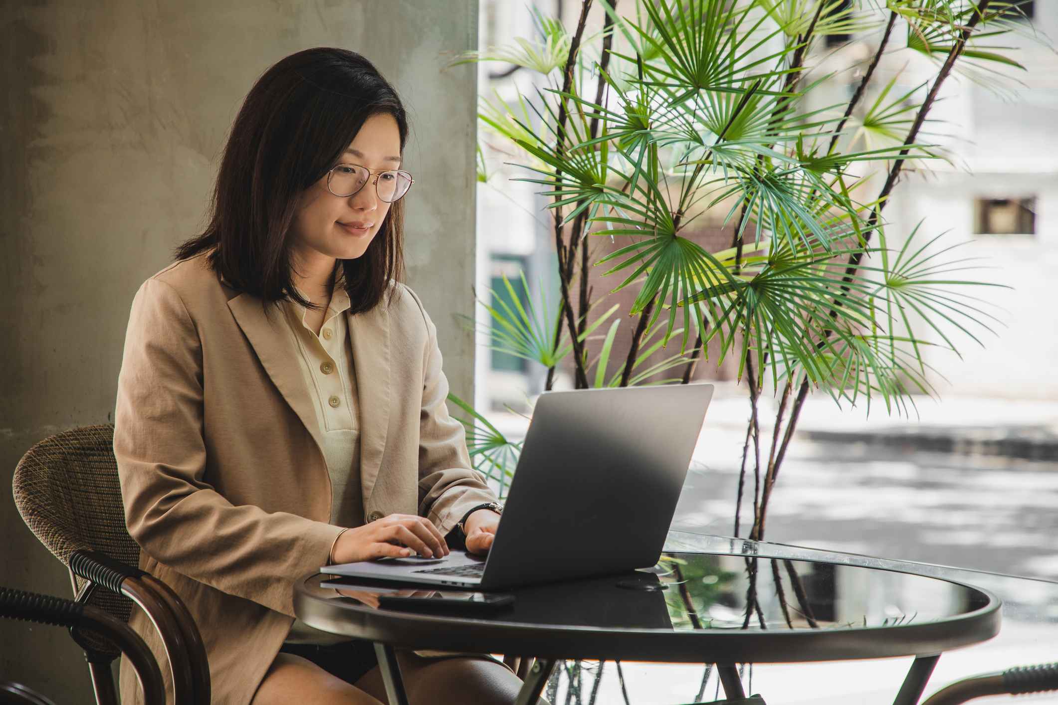 Woman-using-laptop-to-look-for-jobs-best-places-to-look-for-jobs