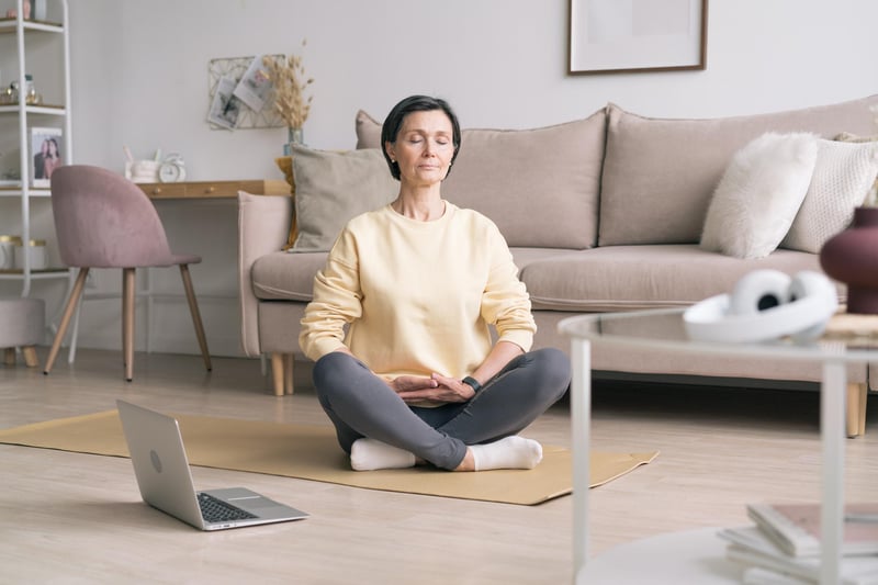 Woman-with-eyes-closed-meditating-at-home-protect-your-energy