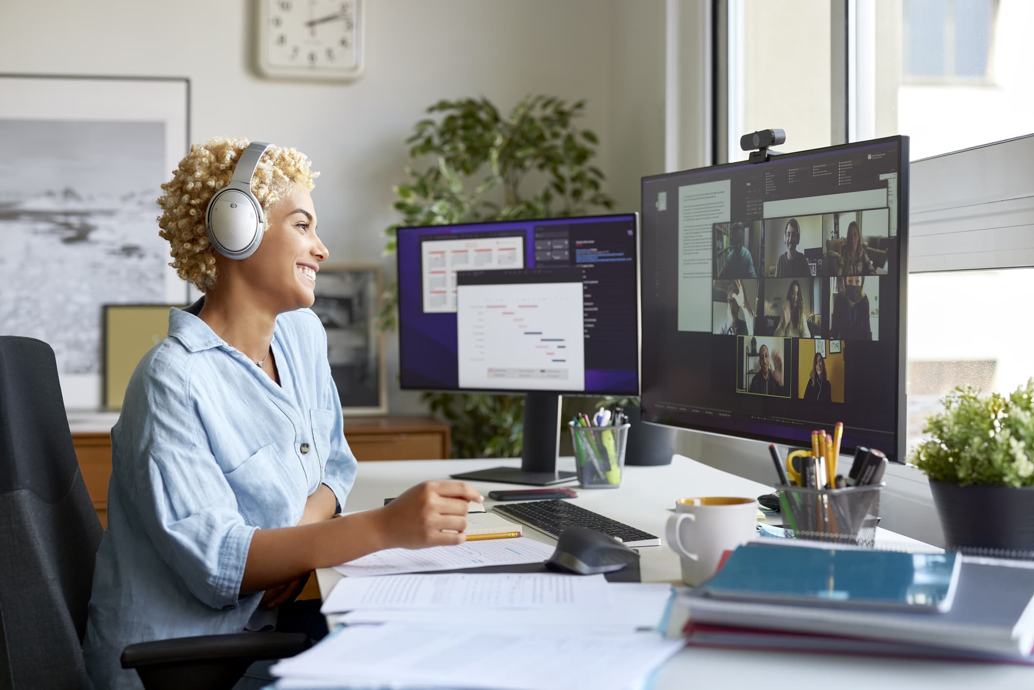 Woman-working-from-home-on-video-conference-with-team-internal-candidate