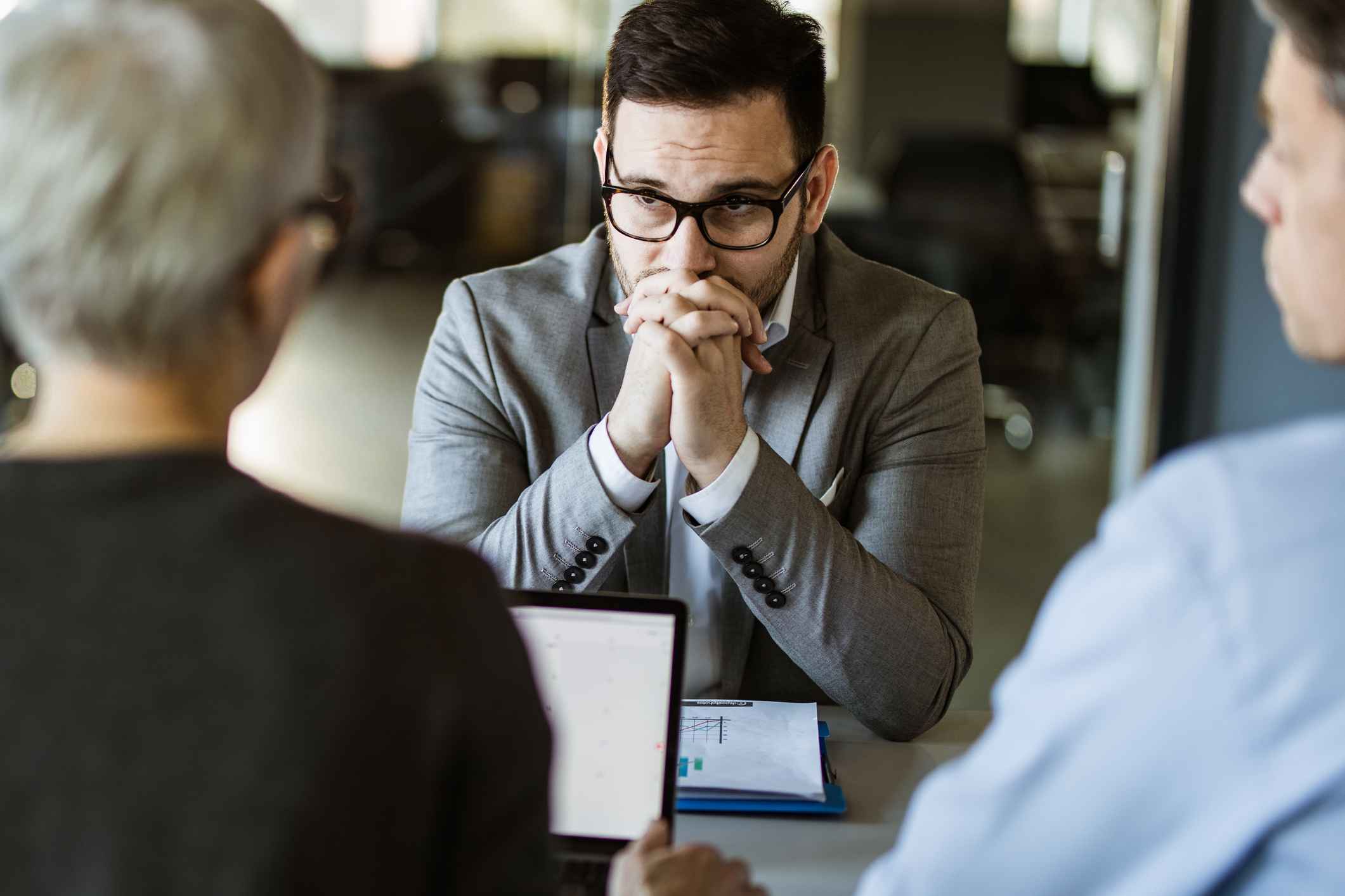 Worried-male-candidate-having-a-job-interview-signs-of-good-interview