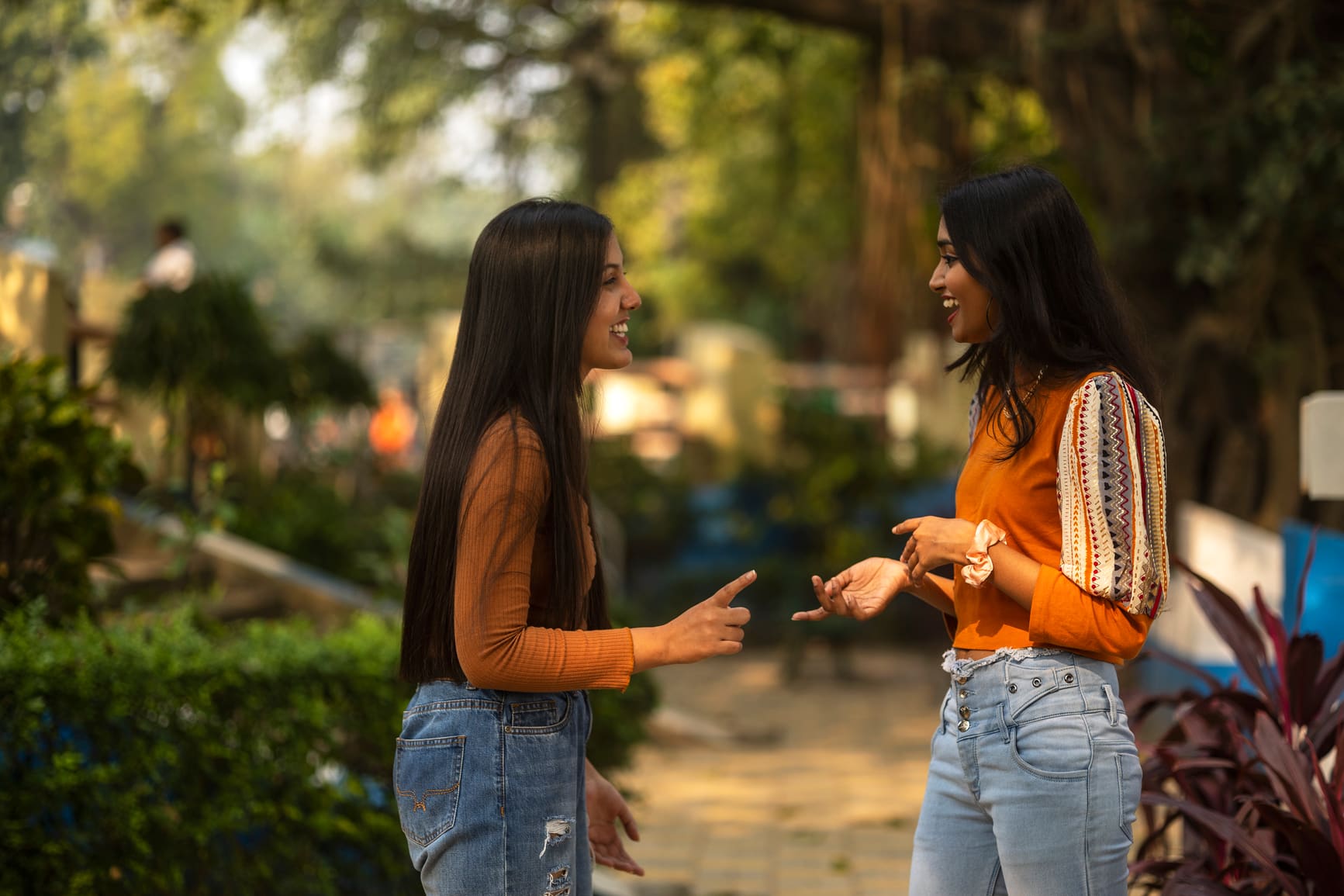 Young-Girls-Interacting-And-Making-Laugh-At-Outdoors-types-of-nonverbal-communication