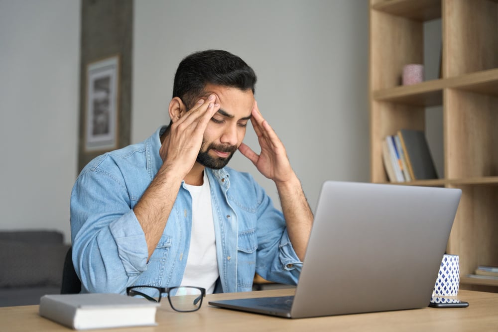 Young-indian-exhausted-business-man-endurance-vs-resilience