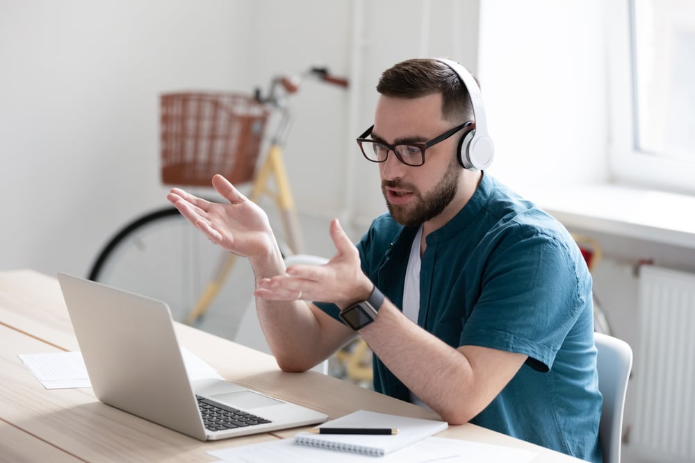 Young-man-in-an-online-meeting-tell-us-about-yourself