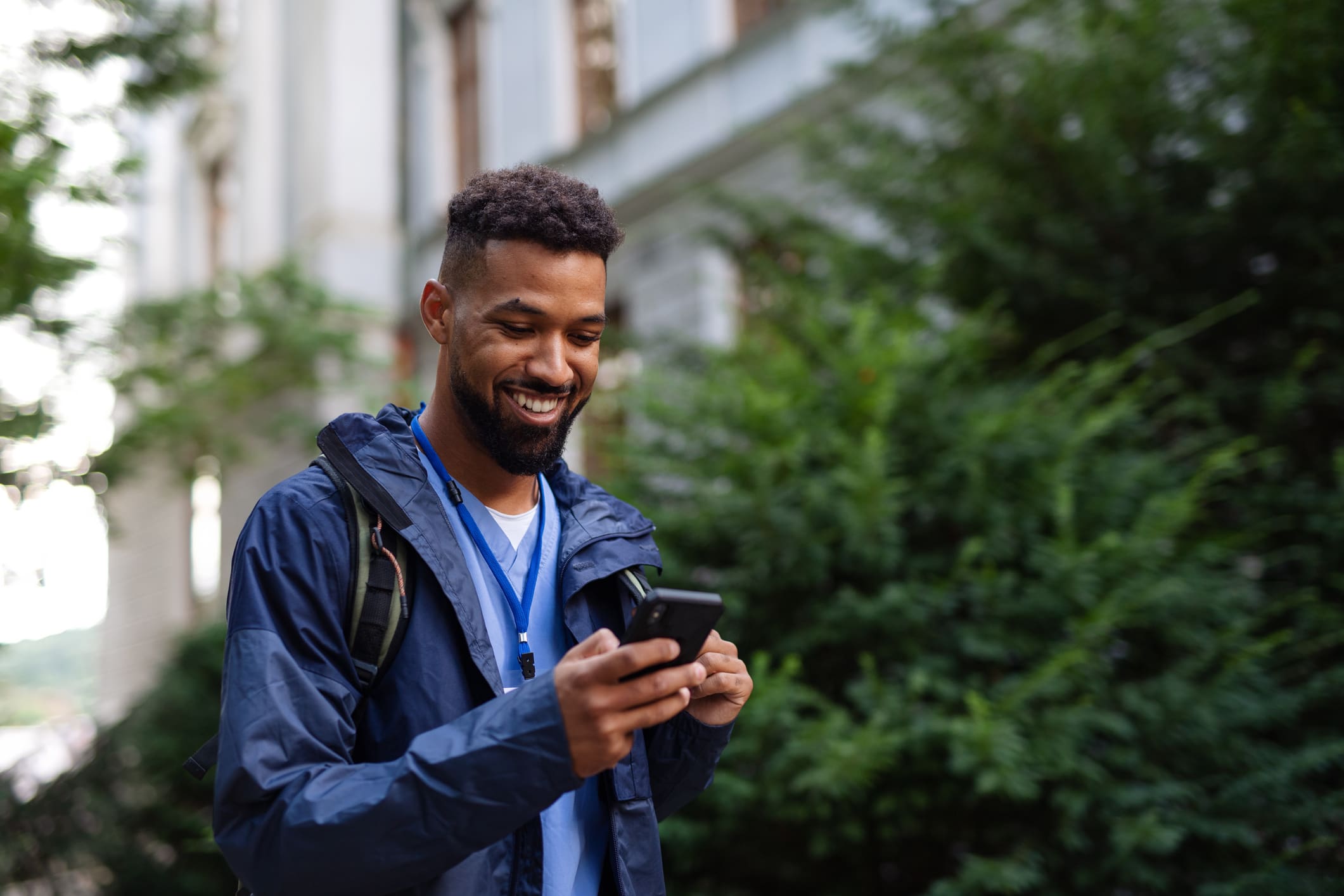 Young-man-receiving-good-news-on-his-phone-after-rejecting-offer-how-to-reject-internship-offer