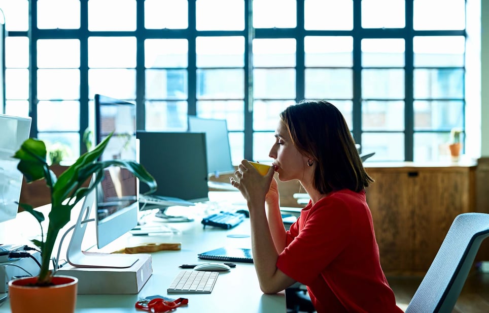 Young-woman-taking-coffee-the-importance-of-taking-breaks