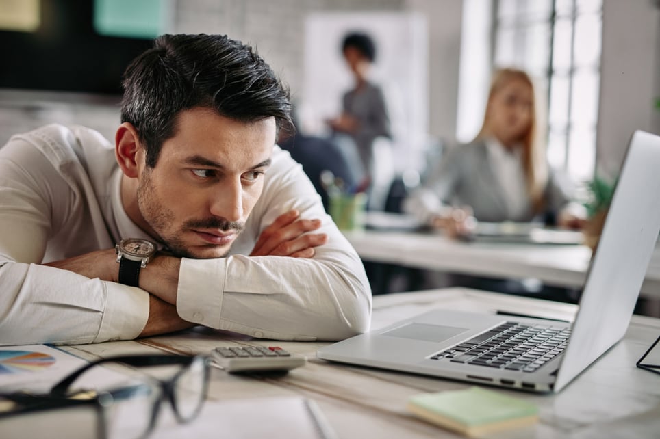 Young-worker-having-break-and-resting-bored-at-work