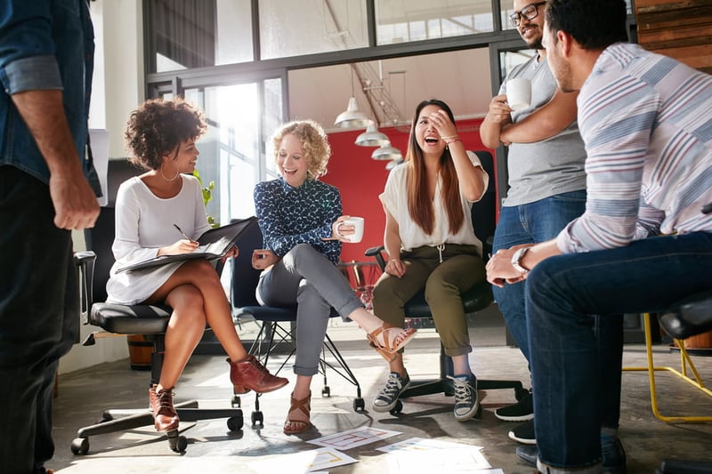 business-colleagues-laughing-what-to-say-during-exit-interview