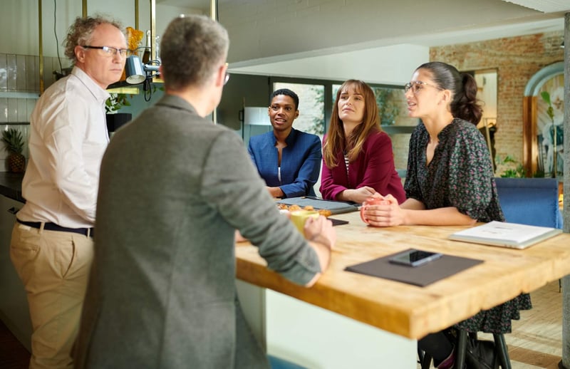 colleagues-gathering-in-kitchen-how-to-deal-with-rude-people