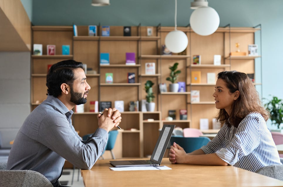 coworkers-having-a-meeting-at-coffee-shop-how-to-talk-to-your-boss-about-mental-health