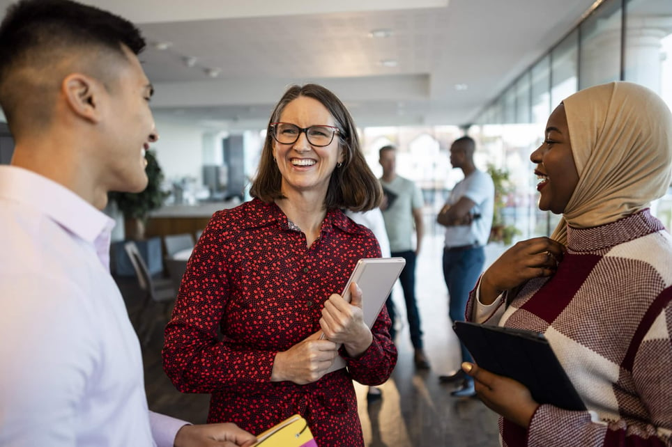 diverse-group-of-coworkers-having-a-laugh-how-resilience-can-help-you-with-stress