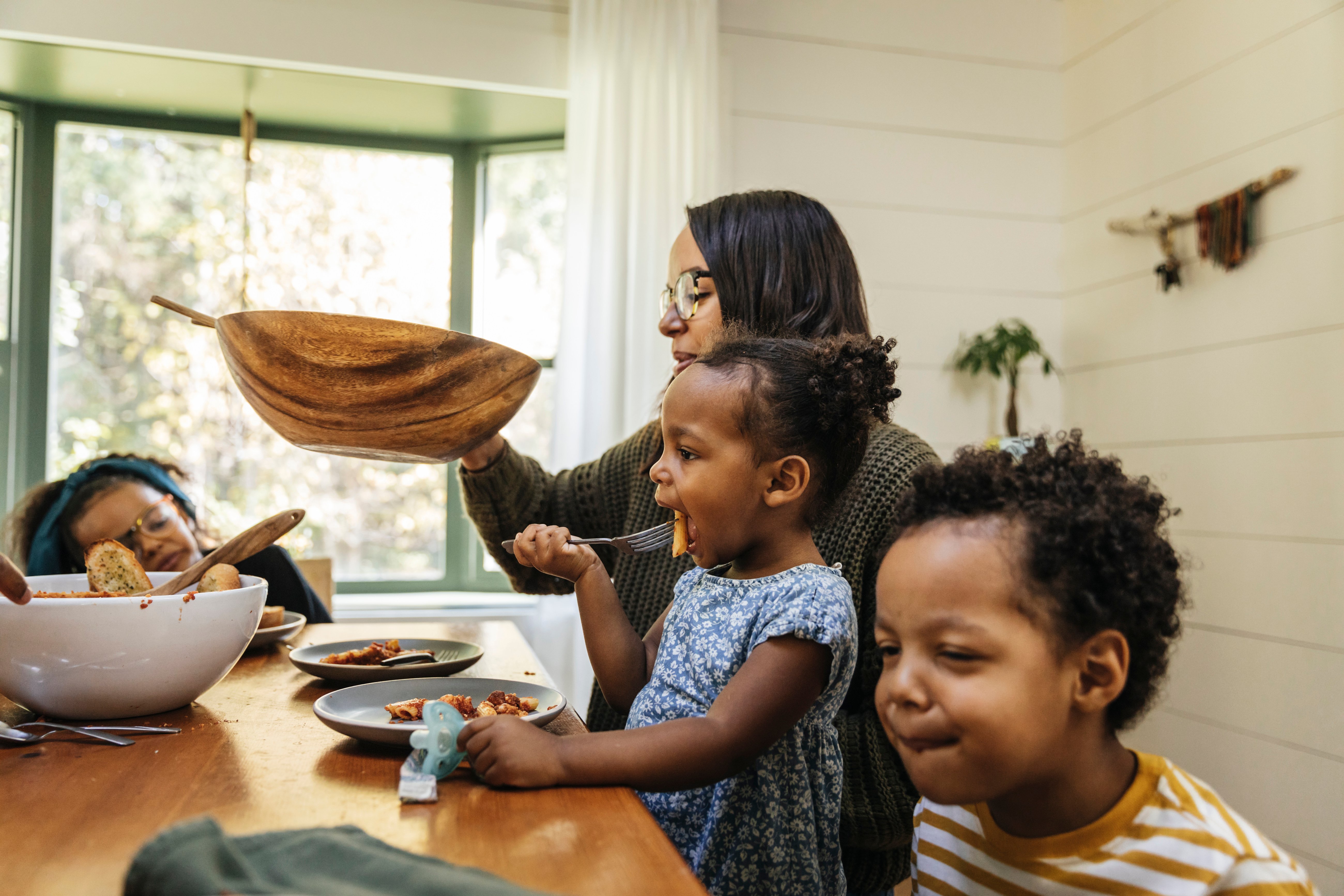 family-eating-dinner-sandwich-generation