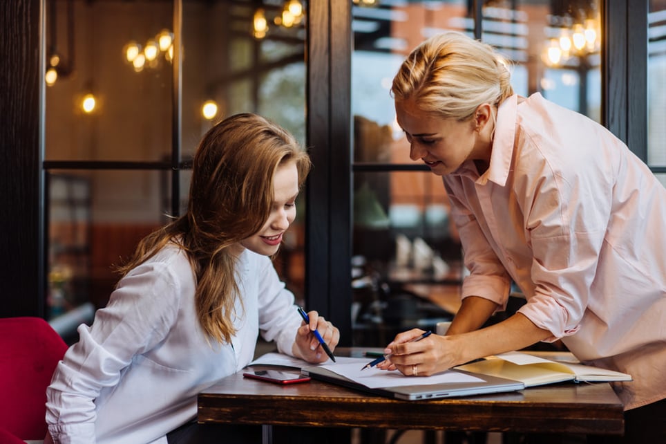 female-boss-delegating-working-plans-work-life-balance-for-managers