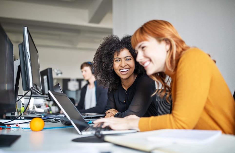 female-coworkers-working-together-how-to-make-yourself-indispensable-at-work