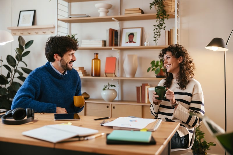 freelancers-talking-during-coffee-break-meaning-of-personal-values