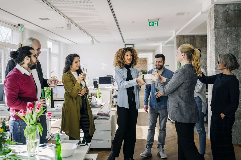 group-of-coworkers-celebrating-a-promotion-for-one-of-them-no-promotion-after-5-years