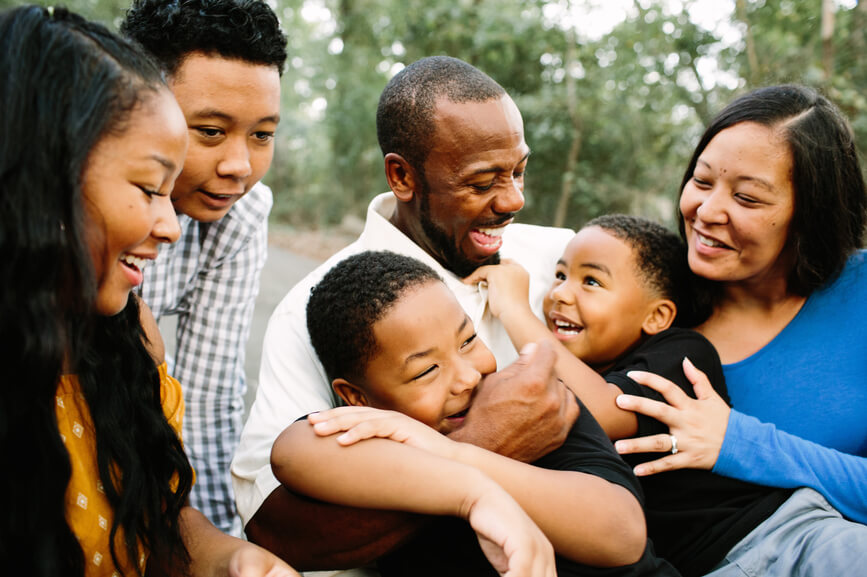 happy-family-cuddling-looking-at-each-other-family-values