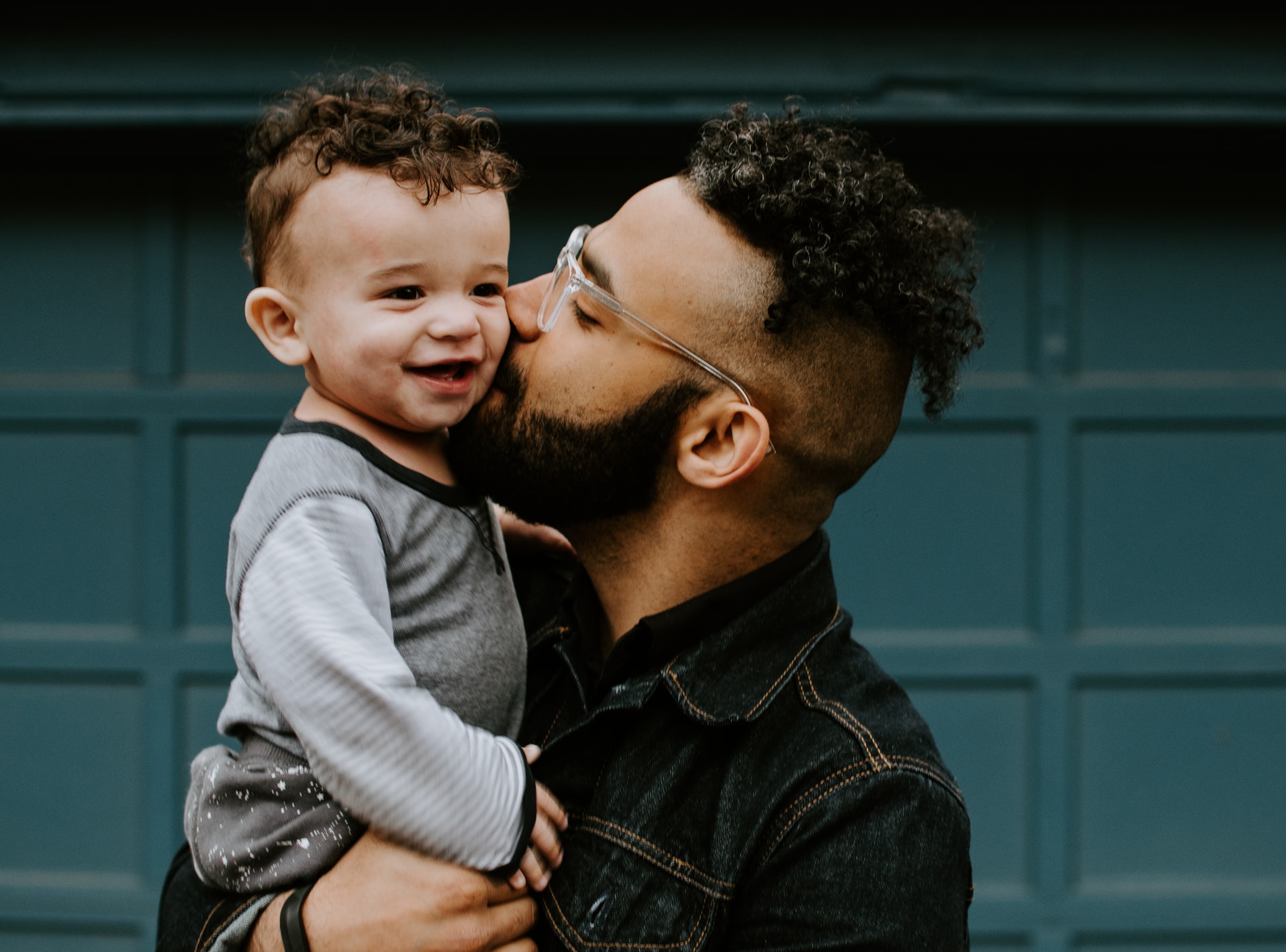 man-holding-baby-self-acceptance