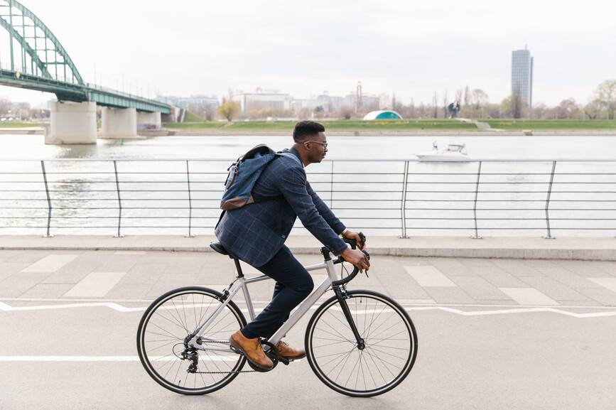 man-riding-his-bicyclein-the-city-climate-change-and-health