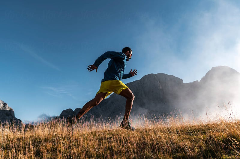 man-running-outside-mental-health-in-athletes