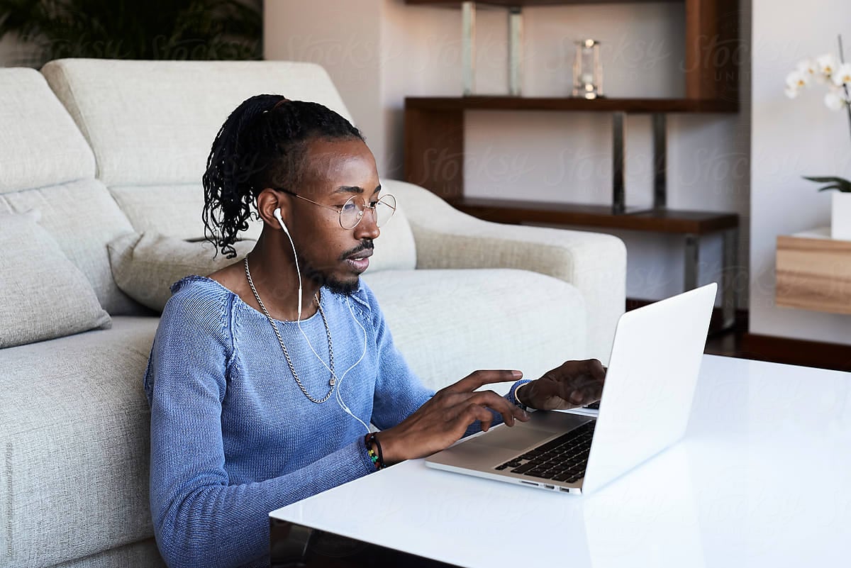 man-working-at-coffee-table-how-to-work-from-home