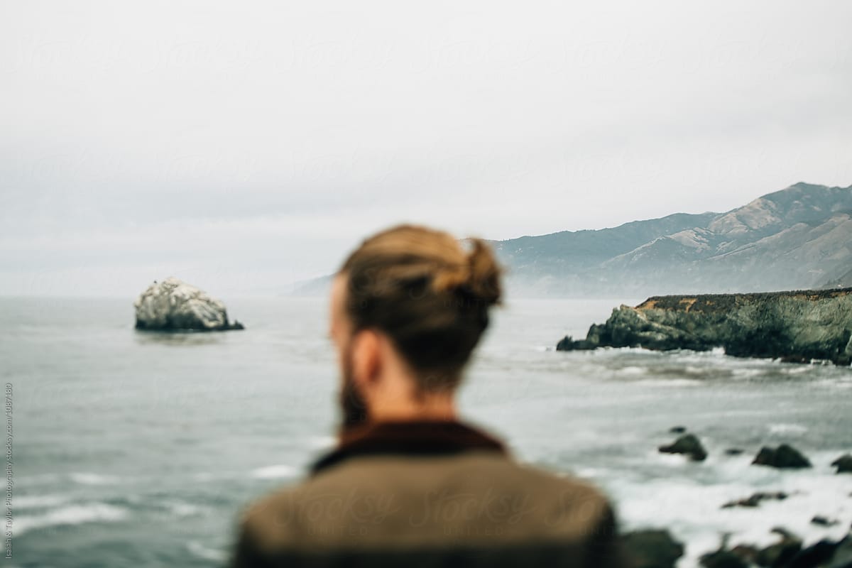 manbun-looking-out-to-sea-types-of-grief