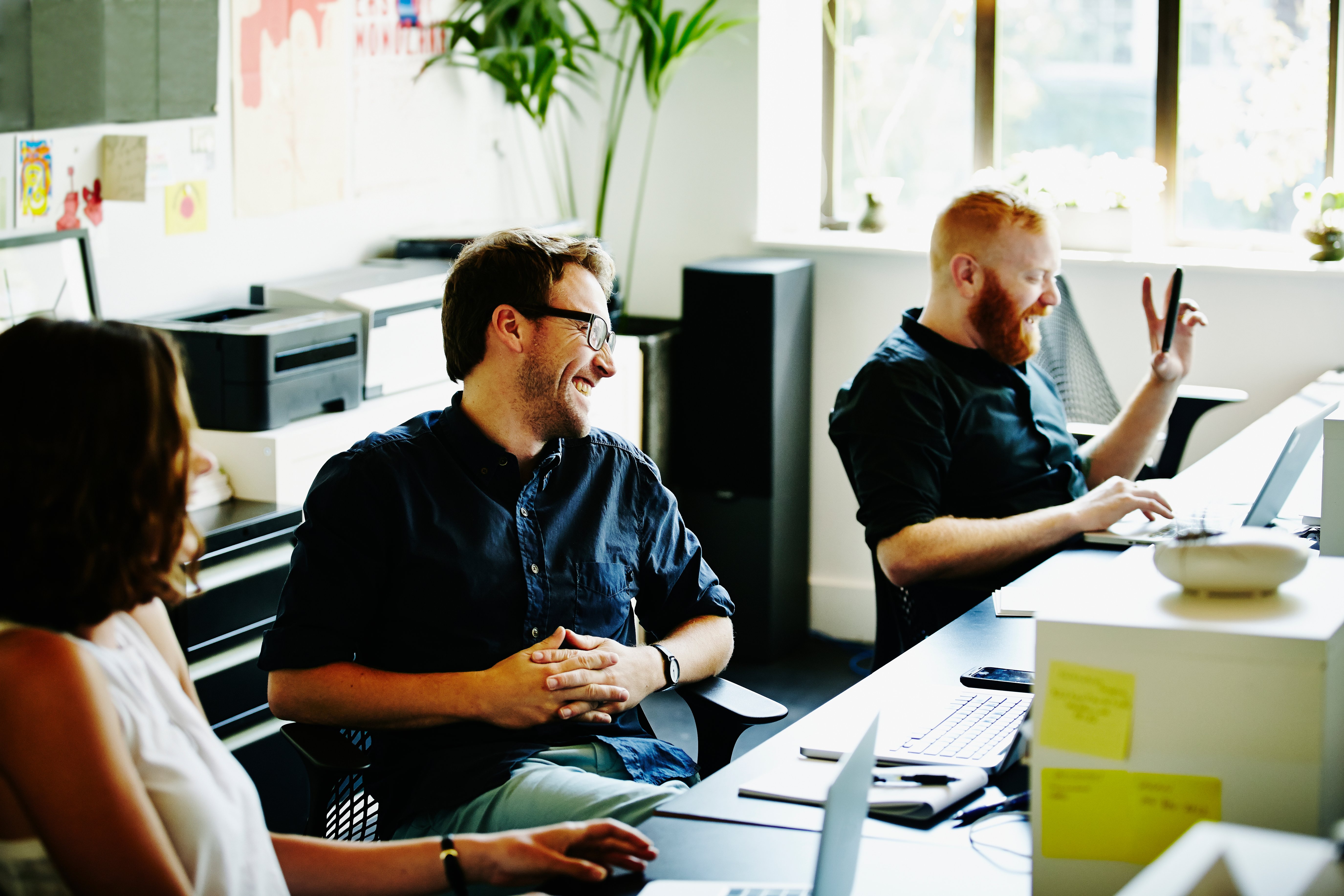 people-laughing-at-work-bring-your-whole-self-to-work