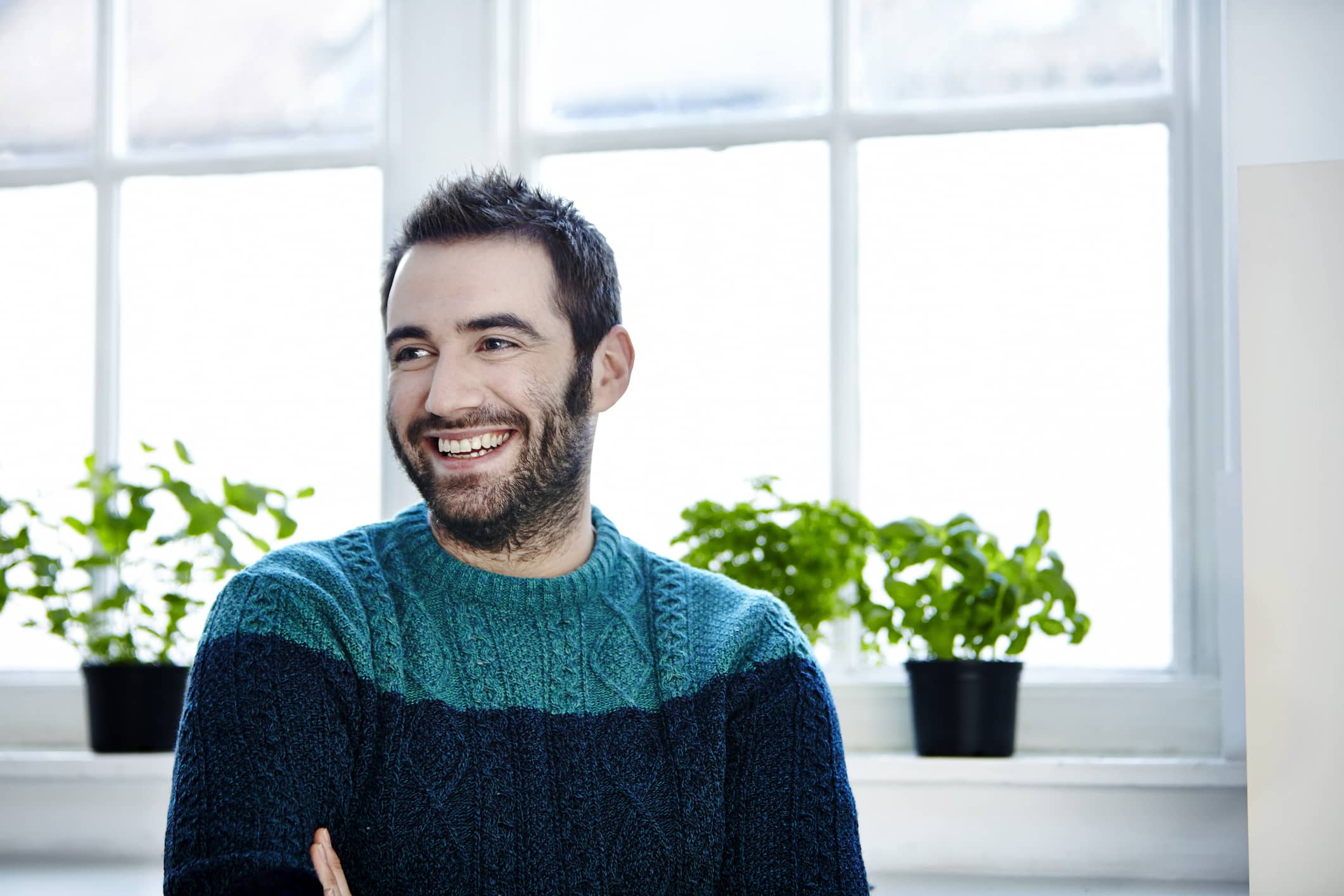 portrait-of-a-man-surrounded-by-plants-social-skills-examples