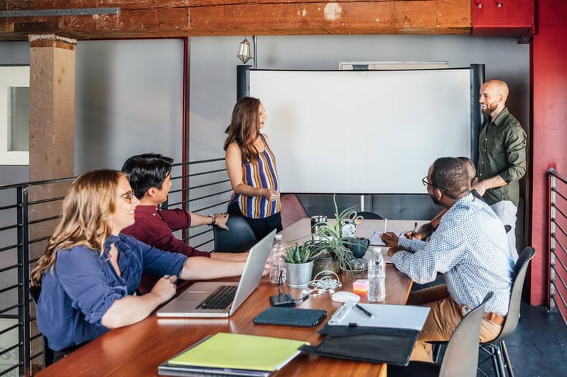 manager-giving-presentation-to-employees-reskilling