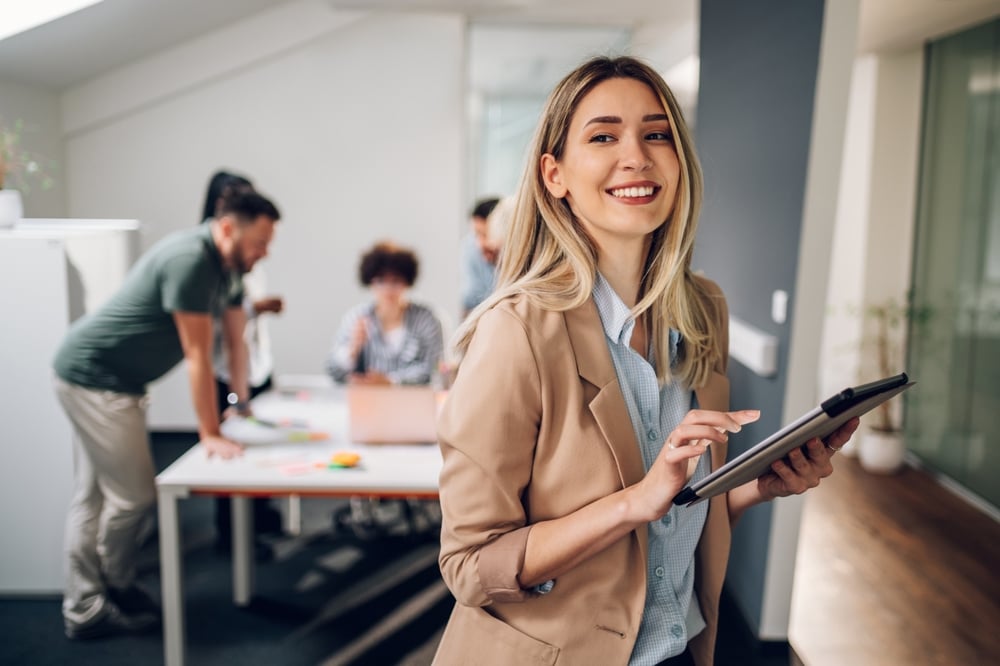 smiling-confident-business-leader-how-to-answer-why-do-you-want-to-work-here