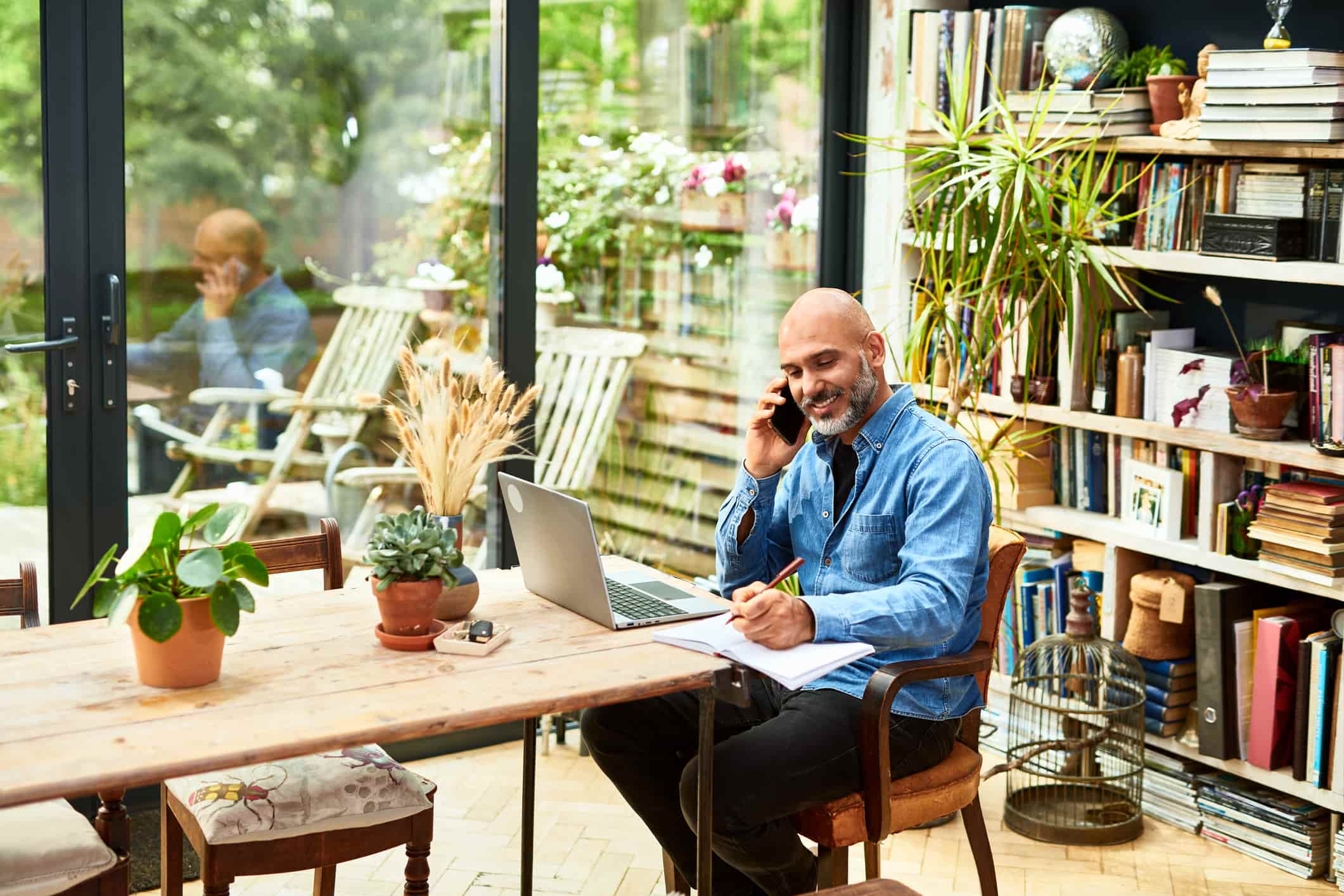 smiling-man-writing-an-email-intro-to-new-team-email