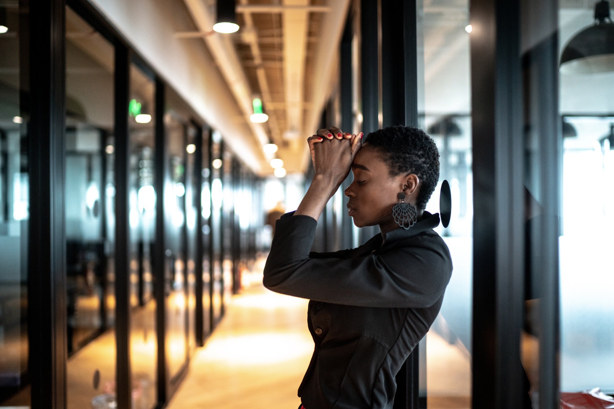 stressed-employee-at-the-hallway-autocracy-pros-and-cons