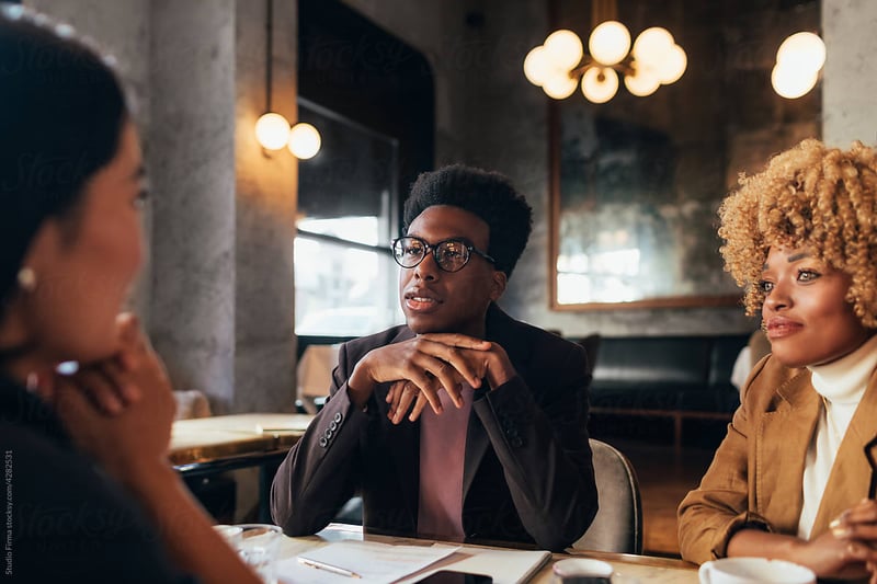 team-listening-at-table-executive-presence