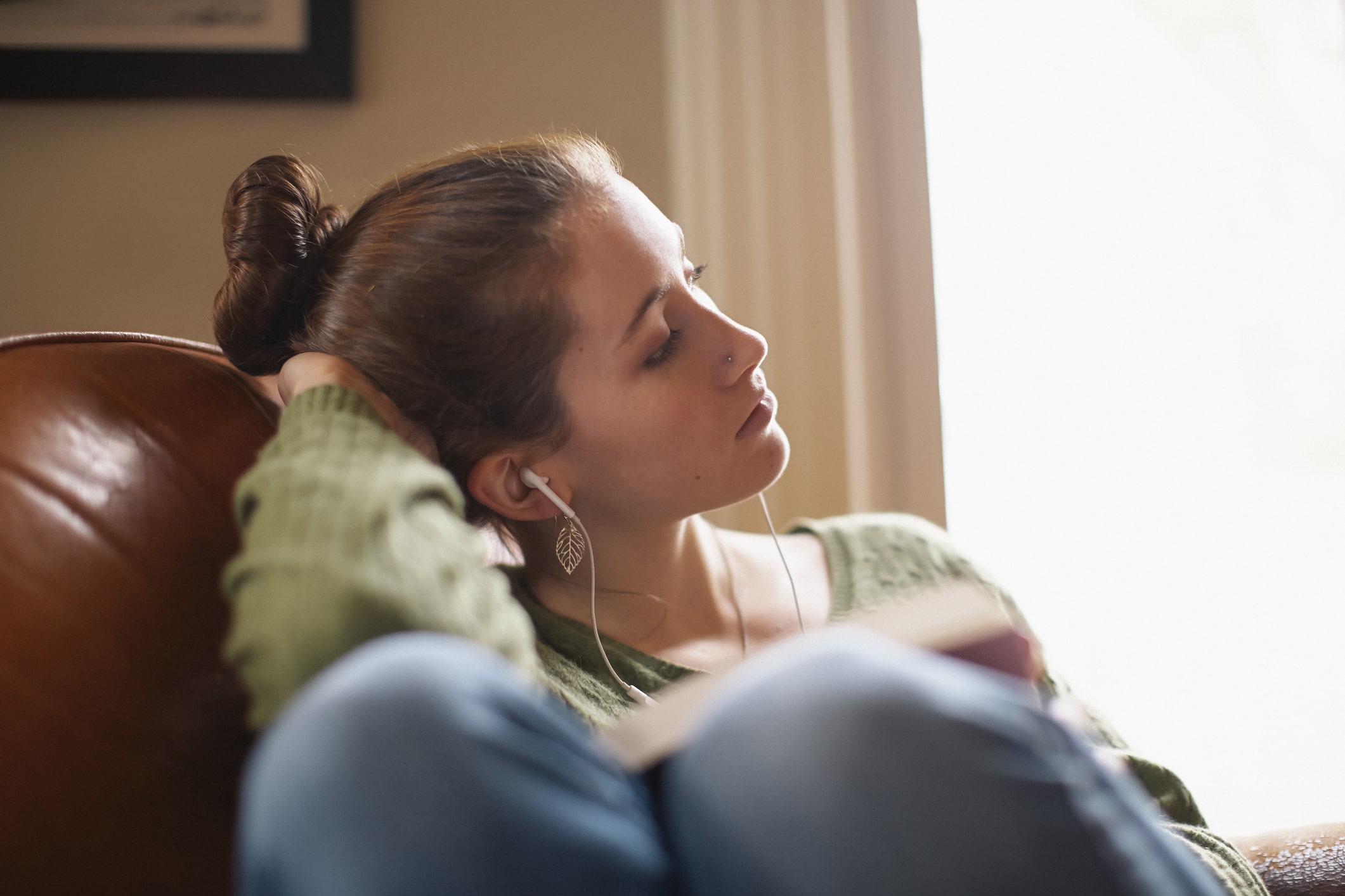 teenage-girl-relaxing-and-listening-to-music-stress-triggers