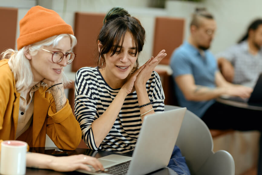 two-colleagues-working-together-direct-reports