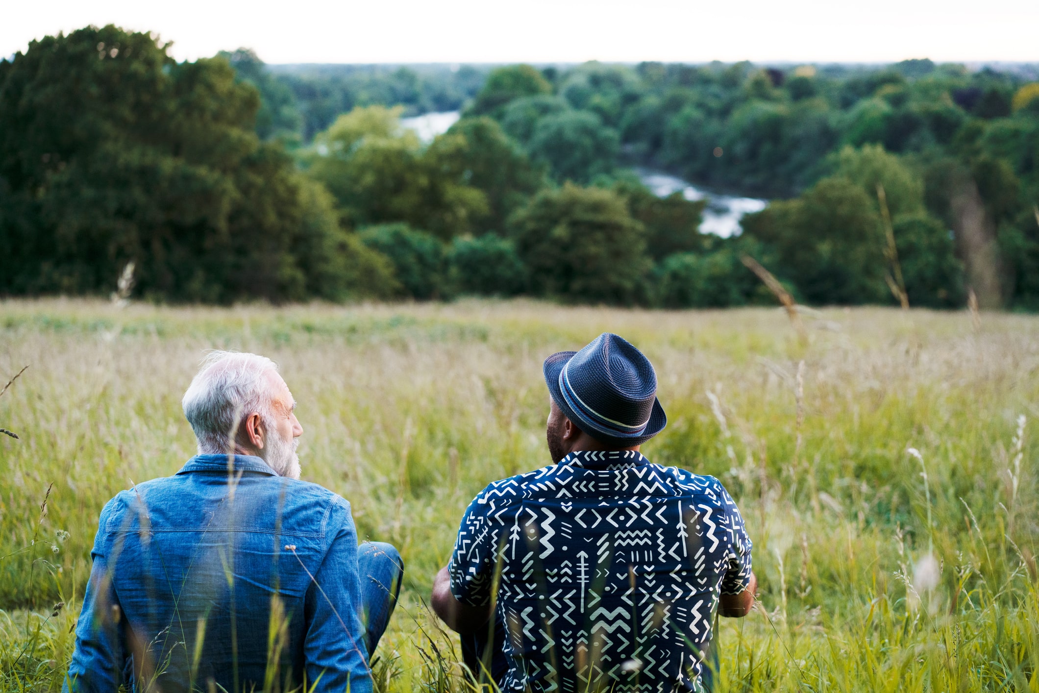 two-men-sat-talking-looking-at-view-how-to-start-over-in-life