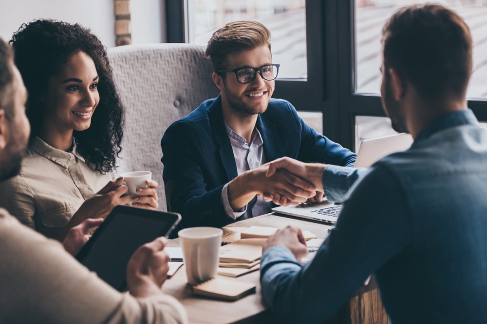 two-men-shaking-hands-how-to-answer-why-do-you-want-to-work-here