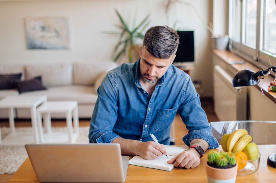 unemployed-man-sitting-at-home-and-trying-to-find-a-job-help-with-job-searching