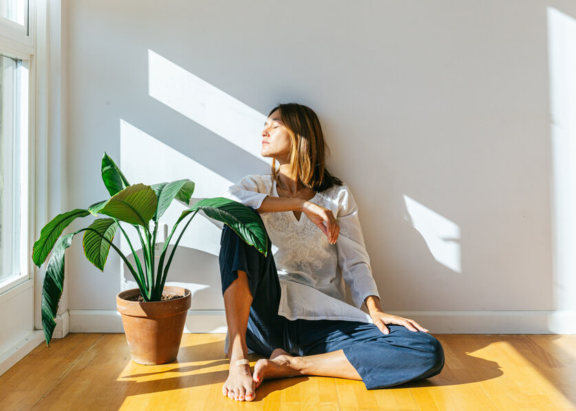 woman-basking-in-sunlight-at-home-circadian-rhythms