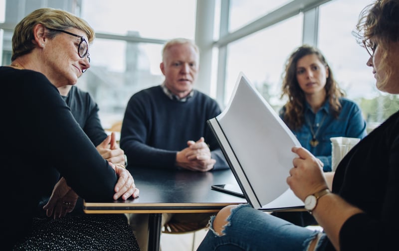 woman-checking-notes-what-to-say-during-exit-interview