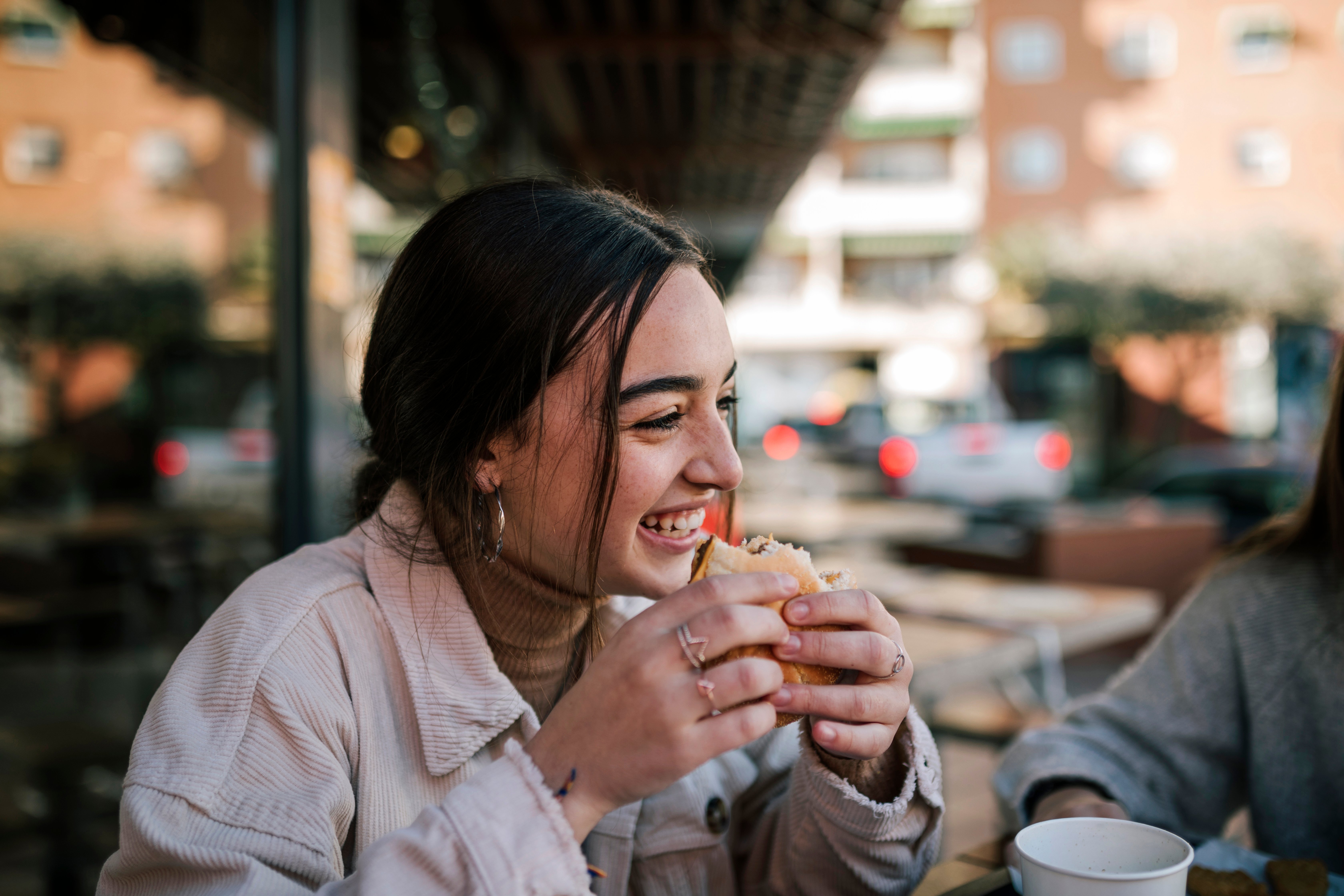 woman-eating-smiling-nutrition-and-mental-health