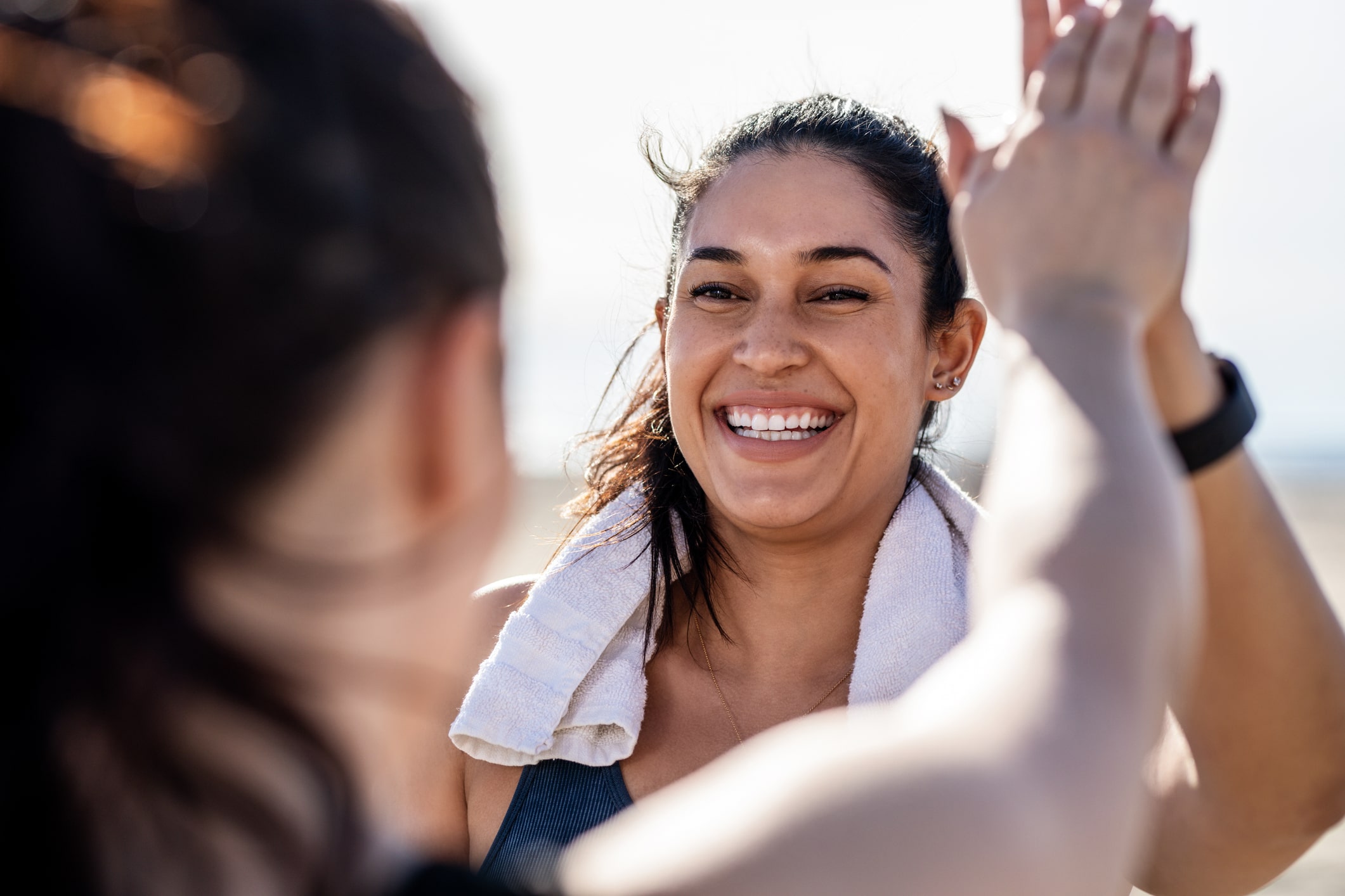 woman-giving-high-five-types-of-stressors