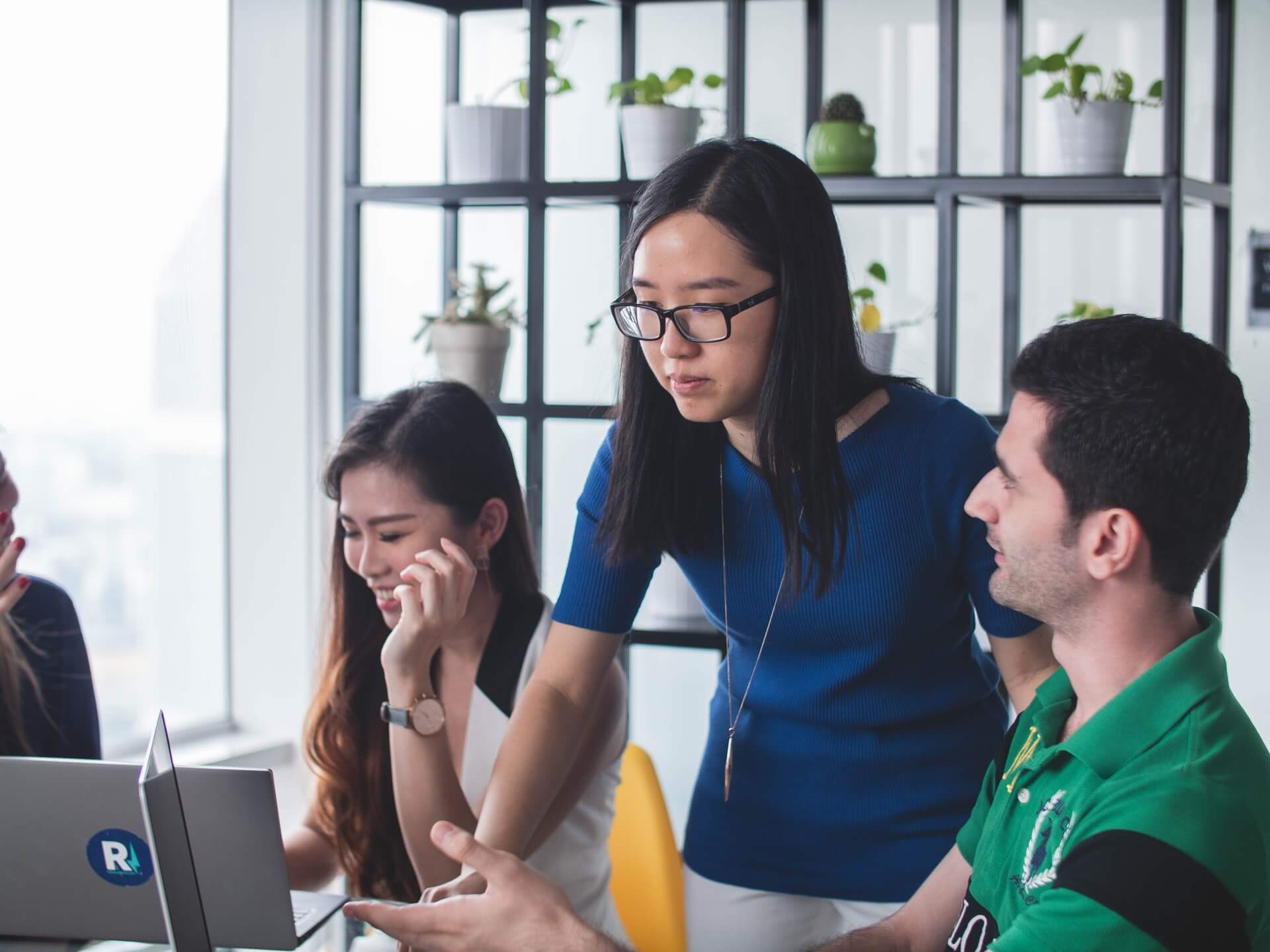 woman-helping-male-colleague-at-work-mind-body-soul