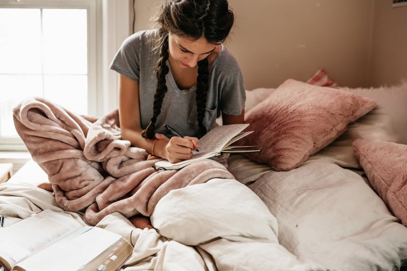 woman-journaling-in-her-bedroom-1