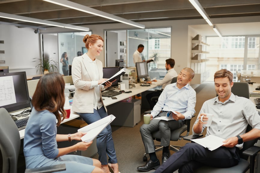 woman-leader-discussing-business-with-her-team-values-of-a-leader