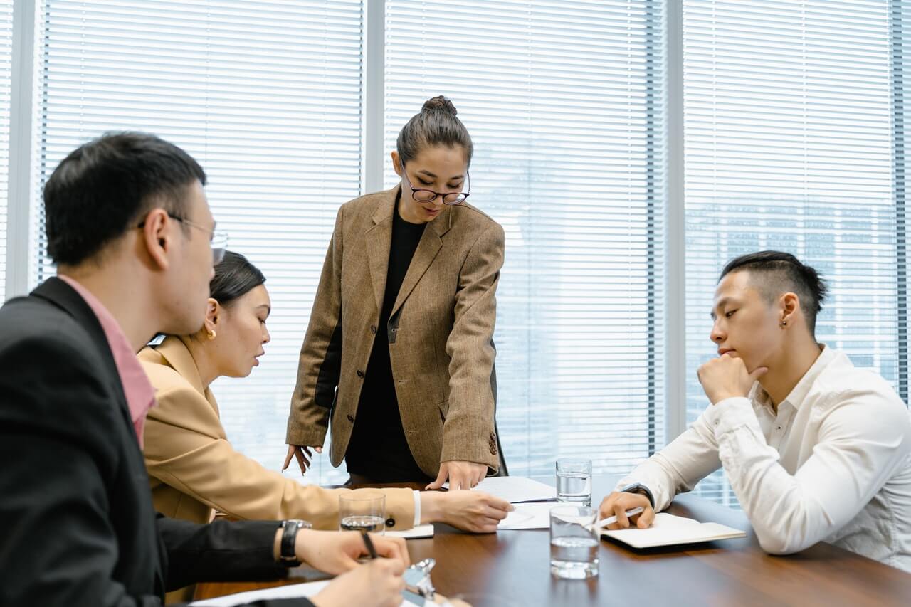 woman-leader-talking-to-her-team-rational-persuasion