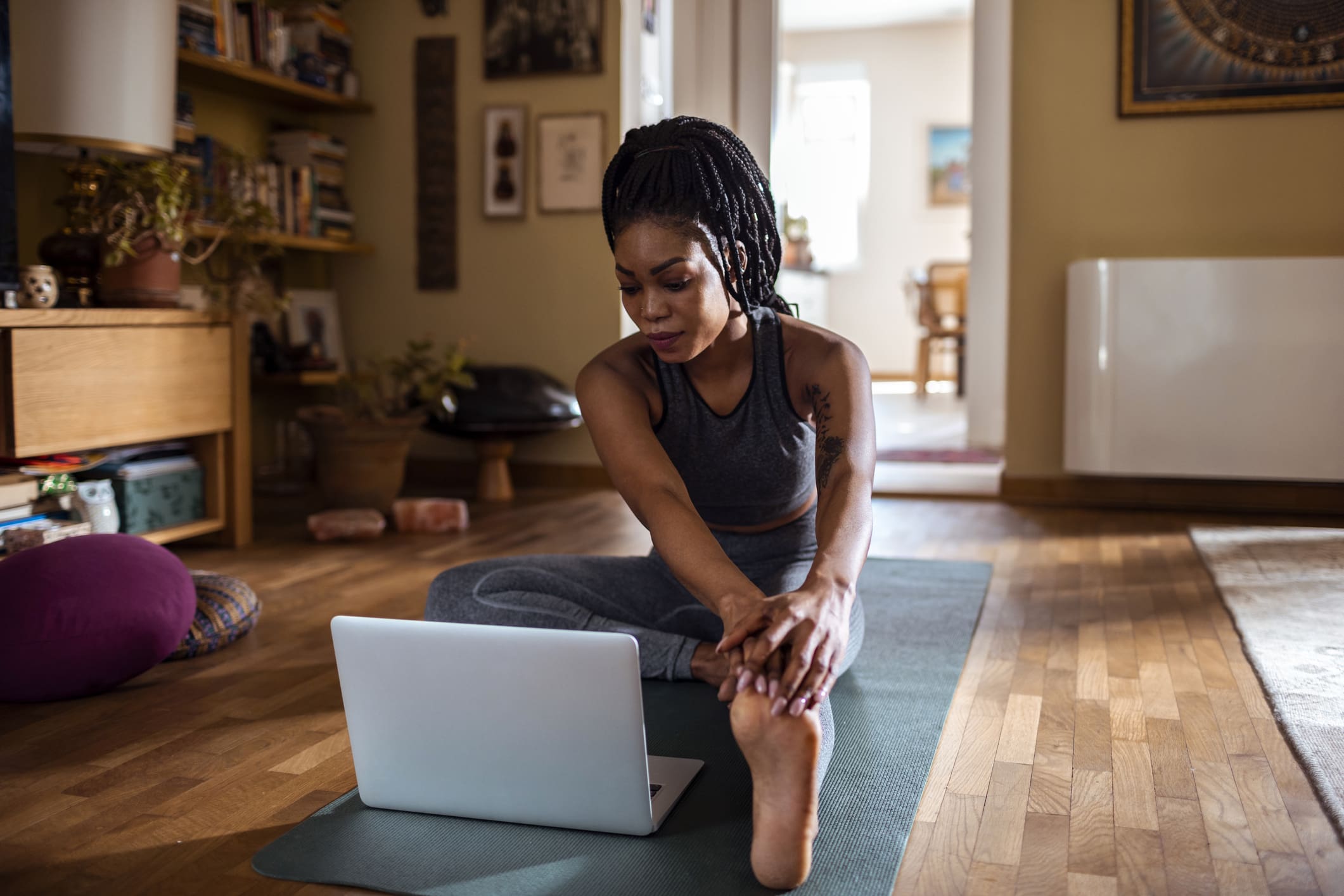 woman-learning-the-janu-sirsasana-pose-distress-vs-eustress