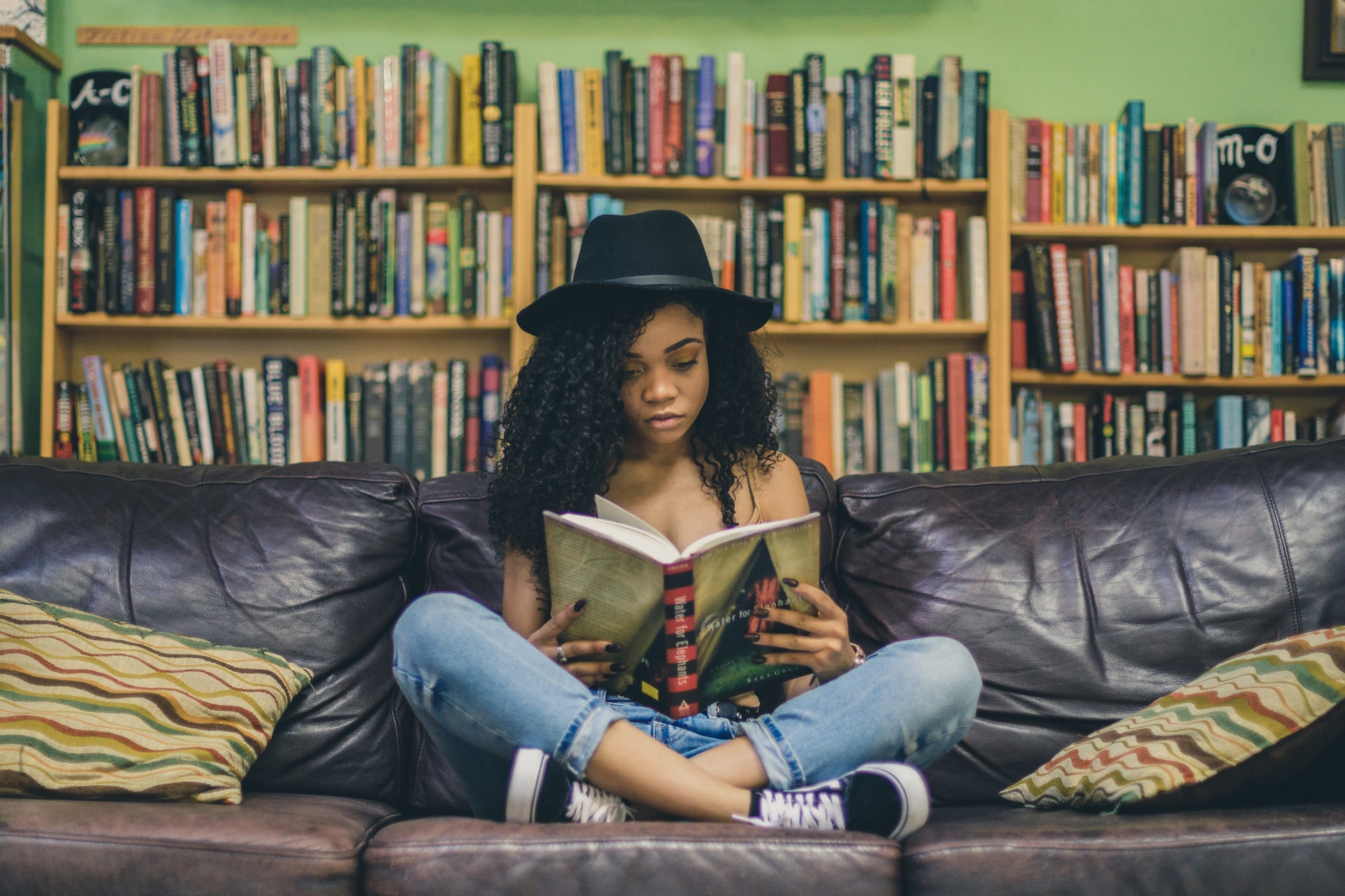 woman-on-sofa-reading-self-acceptance