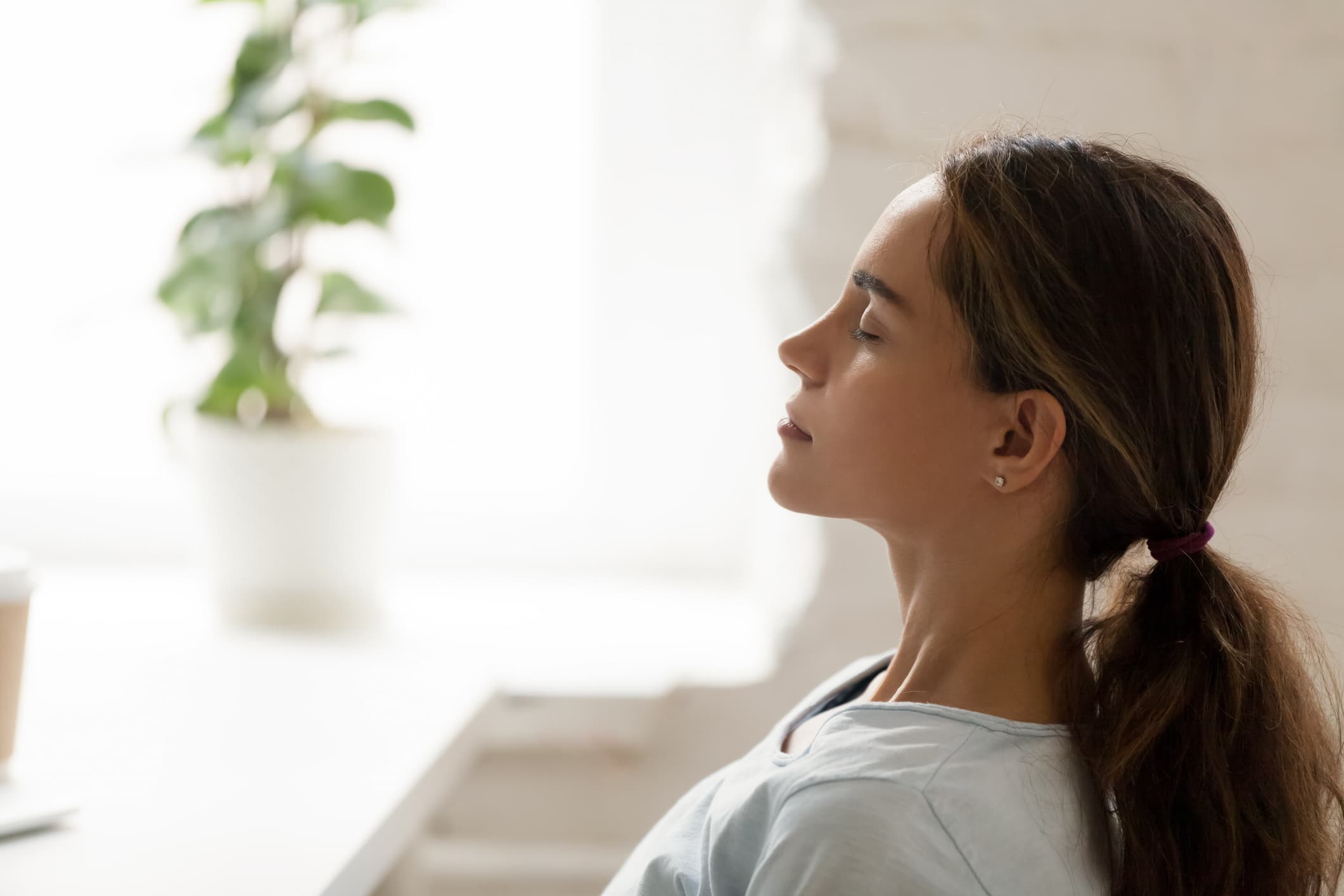 woman-relaxing-on-her-couch-laid-off-from-work